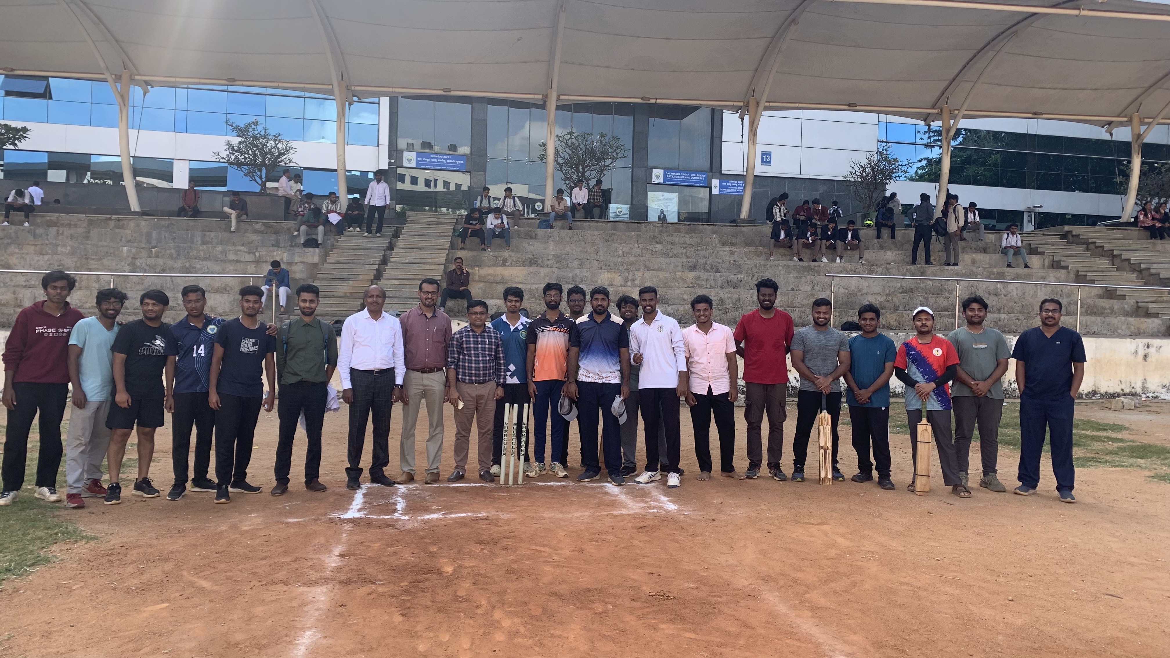 Women's cricket team in black uniforms