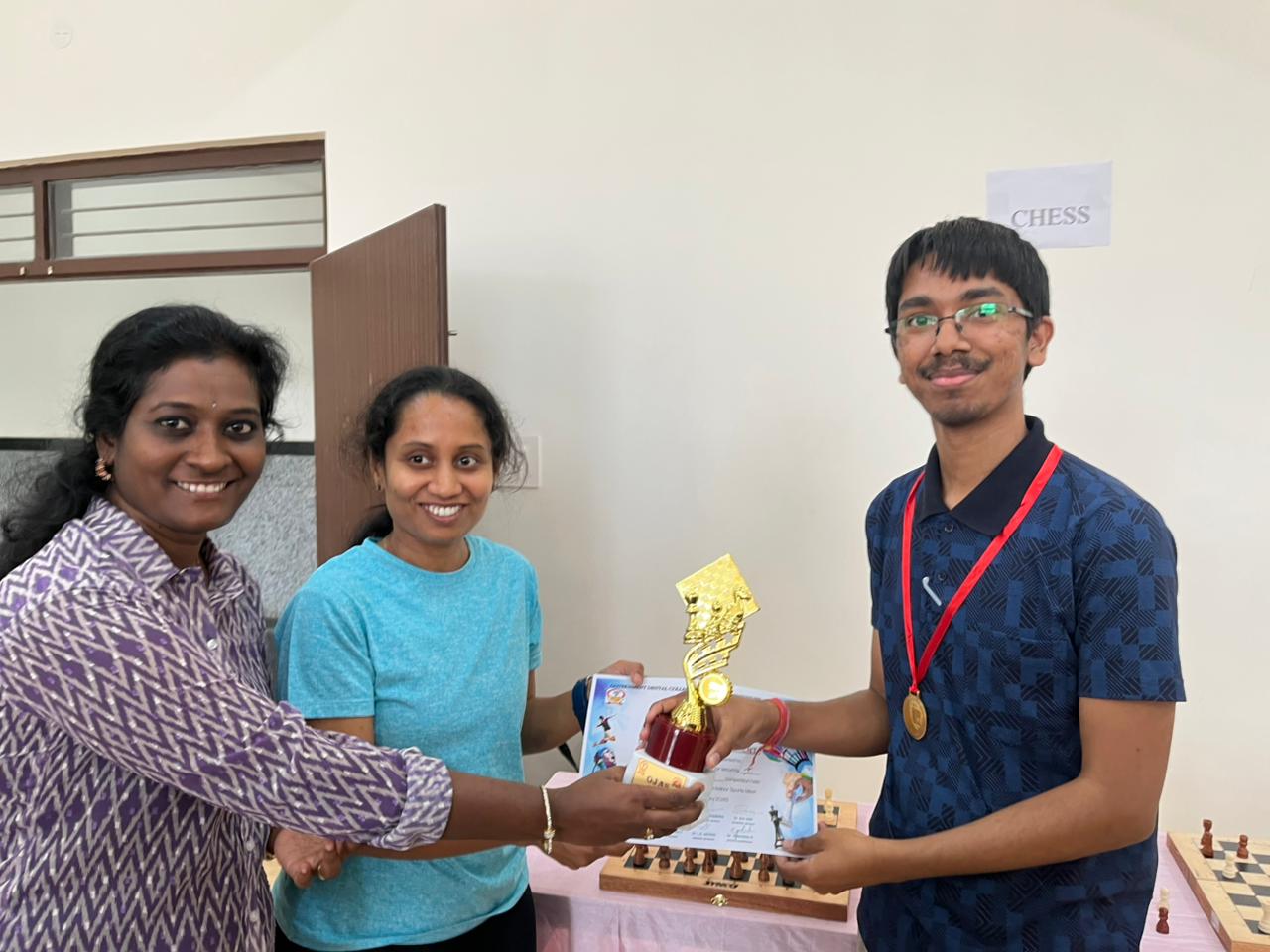 Medal winners group photo with Principal Prof. Dr. Hemanth M