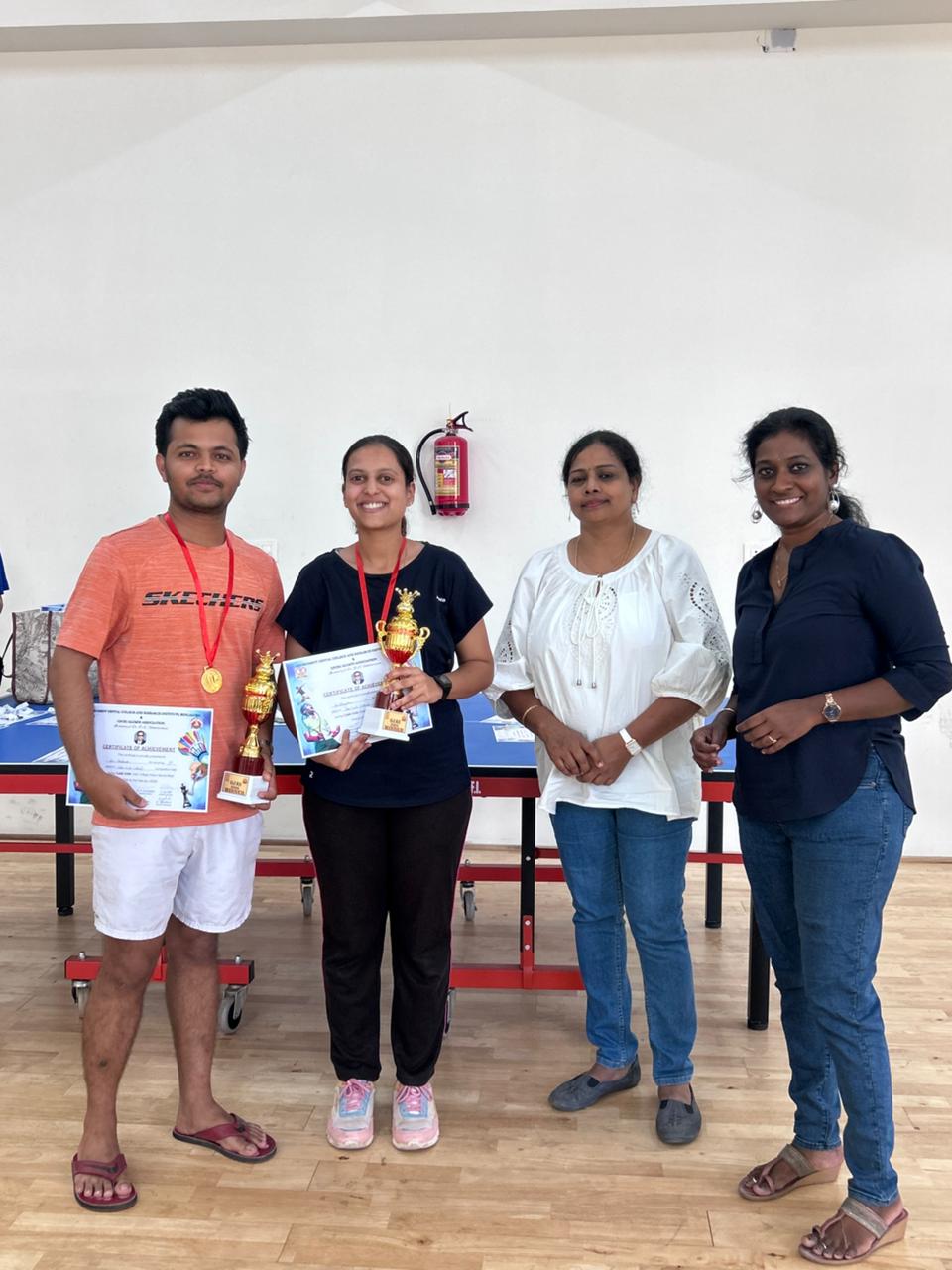 Dr. Shashank and Dr. Divya Shree receiving Table Tennis Mixed Doubles Gold Medal