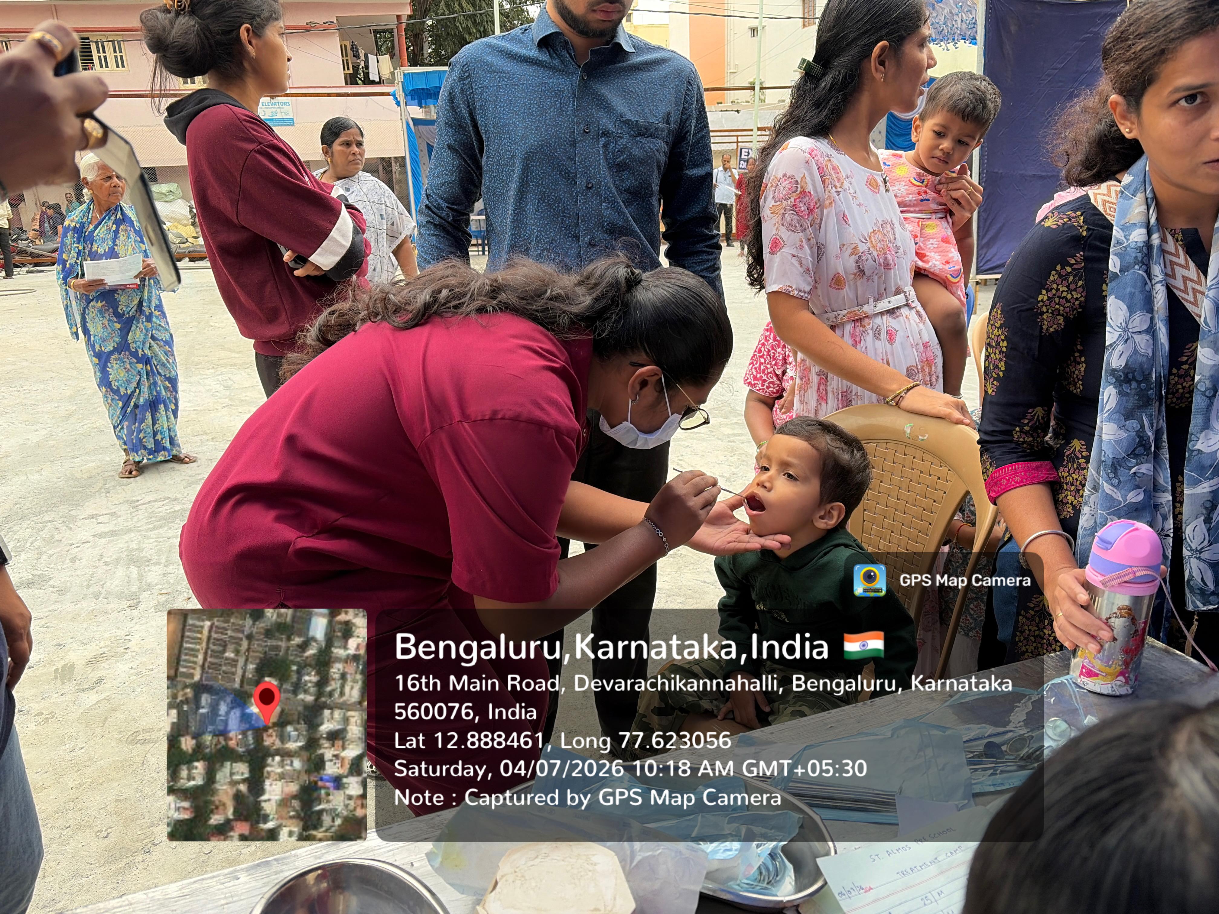 Dentist screening a child patient