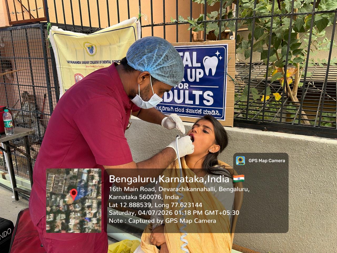 Dentist screening a young child's teeth