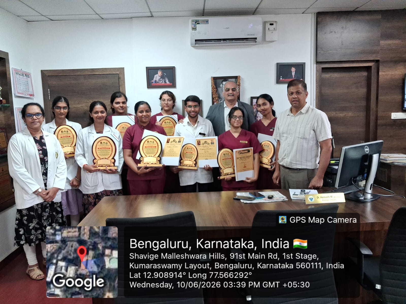 Certificate and trophy awarded to Pranetta R for UG Student of the Year (I BDS)