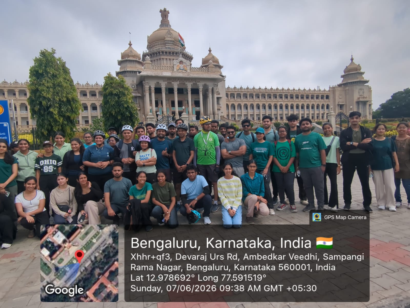 Group of cyclists and organizers with banners at Lalbagh