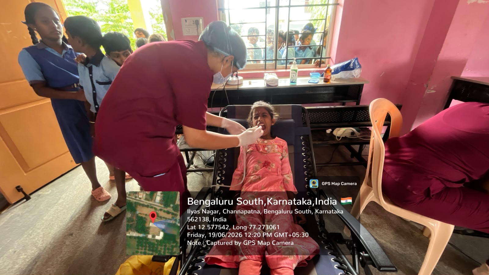 Dental professionals giving health education to students